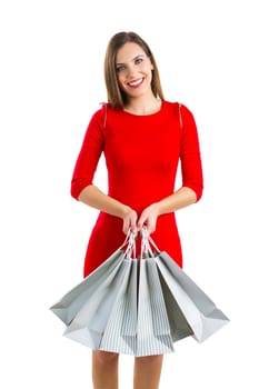 Beautiful and attractive woman holding shopping bags