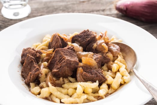 Goulash with Spätzle in the backlight