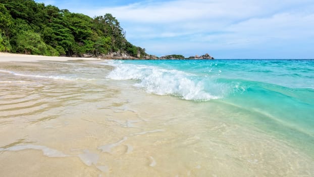 Beautiful landscape blue sea white sand and waves on the beach during summer at Koh Miang island in Mu Ko Similan National Park, Phang Nga province, Thailand, 16
