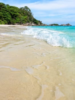 Beautiful landscape blue sea white sand and waves on the beach during summer at Koh Miang island in Mu Ko Similan National Park, Phang Nga province, Thailand