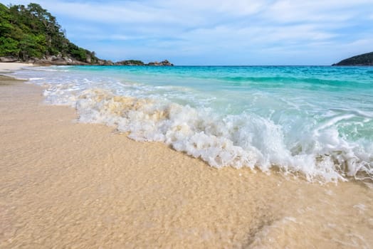 Beautiful landscape blue sea white sand and waves on the beach during summer at Koh Miang island in Mu Ko Similan National Park, Phang Nga province, Thailand