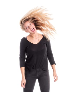 Young woman shakes her wild mane