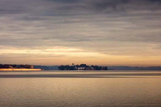 German lake Chiemsee, Bavaria with its famous island Herrenchiemsee in twilight