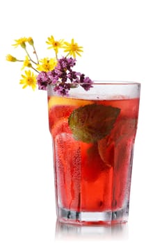 Strawberry mojito garnished with lime slice and marjoram (wild oregano)