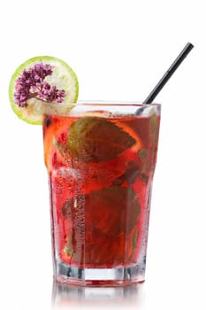 Strawberry mojito garnished with lime slice and marjoram (wild oregano)