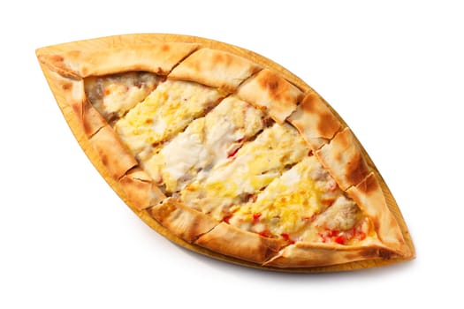 Sliced Turkish Pide on a wooden plate. Traditional Turkish pizza. Healthy dinner