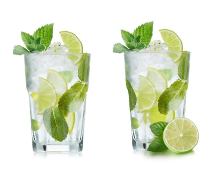 Mojito cocktail in elegant highball glass. Cold refreshing beverage with lime and mint.