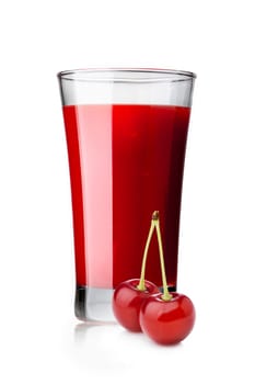 Fresh sour cherry  juice in highball glass with cherries on foreground isolated on white