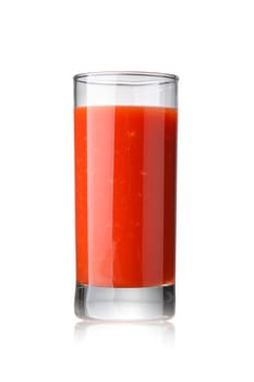 Fresh tomato juice in highball glass isolated on white