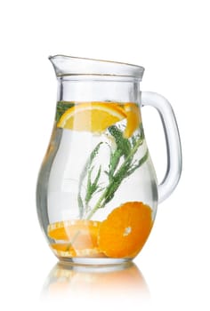 Glass pitchers with tarragon (tarkhun) infused detox water