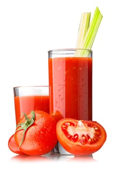 Fresh tomato juice with celery in highball glasses isolated on white