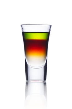 Colorful alcoholic cocktail in a shot glass