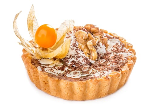 Baked deesert with walnut and cream. Sweet  tart decorated with physalis isolated on white