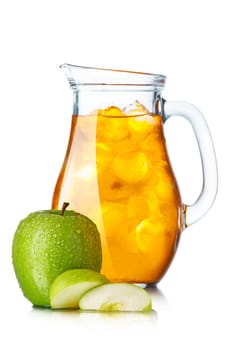 Apple juice with ice in a pitcher. Jug full of iced apple mixed drink.