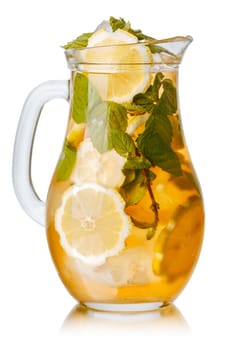 Pitcher of sweet iced tea with lemon and mint.
