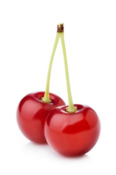 Pair of red ripe cherries