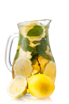Pitcher of sweet iced green tea with lemon and mint.