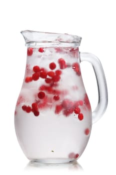 Cranberry  detox water in a glass jug. Healthy iced water infused with cranberry, cowberry and lemon