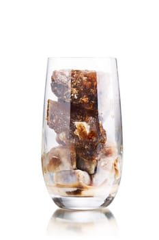 Milk coffee cocktail from frozen coffee cubes in highball glass. Iced milk coffee