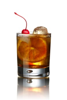Old fashioned alcoholic cocktail decorated with Maraschino cherry. Before dinner IBA official cocktail.