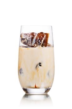 Milk coffee cocktail from frozen coffee cubes in highball glass. Iced milk coffee