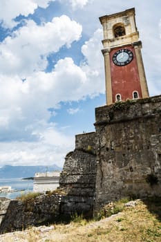 Old tower with clock on the fortress on the Greek island of Corfu (Kerkyra)