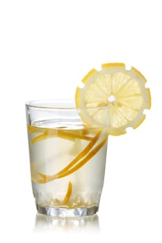 Gin fizz alcoholic cocktail decorated with lemon slice. IBA official cocktail