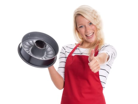 Housewife in apron holds a baking dish and shows thumbs up