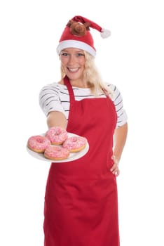 Christmas woman offers a plate of doughnuts