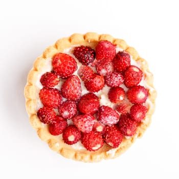 Dessert with wild strawberries.  Sweet tart with wild strawberry