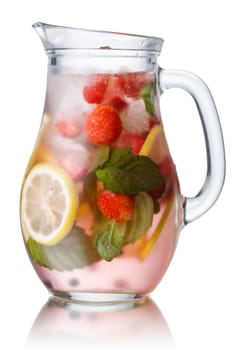 Glass pitcher of strawberry mojito