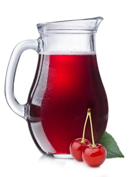 Cherry juice in a misted pitcher. Full jug of sour cherry juice with cherries on foreground