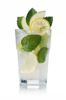 Apple mojito garnished with interleaved apple slices, fresh mint leaves and lemon slices. Variation of popular refreshing cocktail with rum, mint, lemon and an apple.