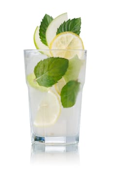 Apple mojito garnished with interleaved apple slices, fresh mint leaves and lemon slices. Variation of popular refreshing cocktail with rum, mint, lemon and an apple.