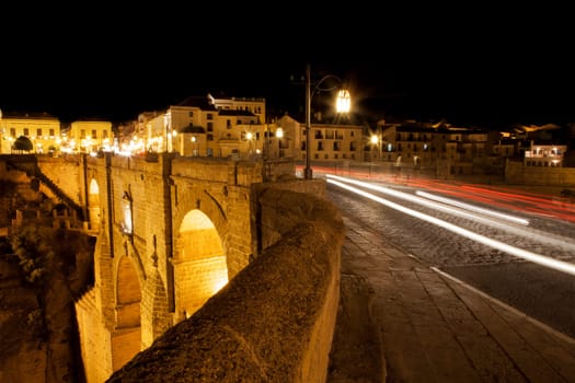 Illuminated bridge from old town of Ronda, Spain. Night scene