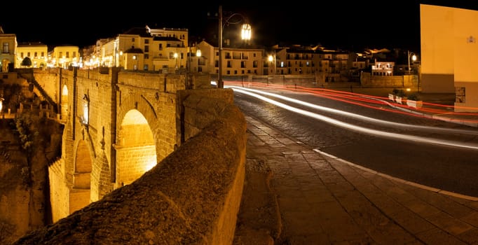 Illuminated bridge from old town of Ronda, Spain. Night scene