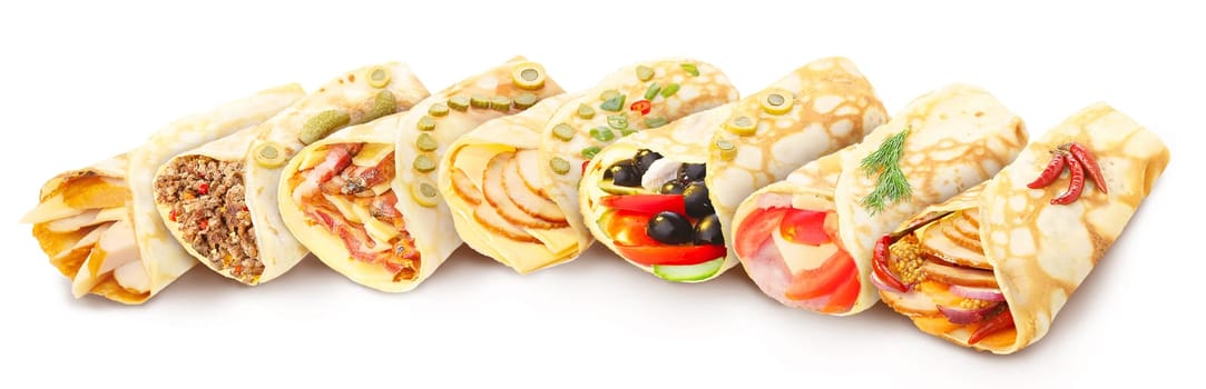 Big collection of elegant,neat, gourmet stuffed crepes decorated with herbs