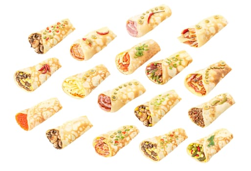 Large collection of elegant,neat, gourmet stuffed crepes decorated with herbs