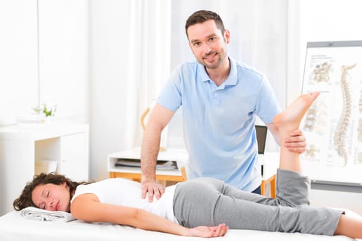 View of a Young attractive woman being manipulated by physiotherapist