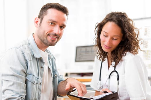 View of a Young attractive doctor dating next appointment