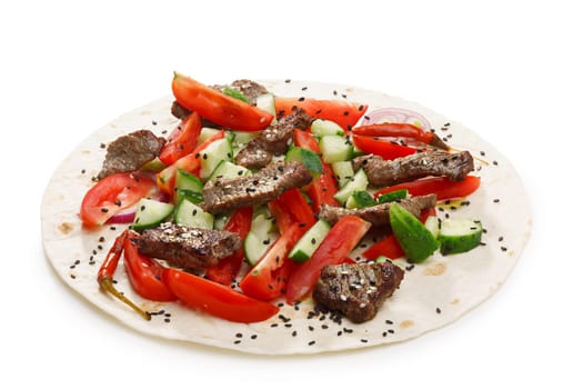 Beef shawarma wrap with vegetables. Infinite depth of field