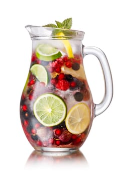 Berry sangria in a glass pitcher. Large depth of field