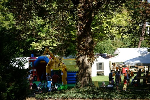 Mainz,Germany - August 29,2015: A children's playground with bouncy castles at the Mainz wine market in the Stadtpark and Rosengarten on August 29,2015 in Mainz.