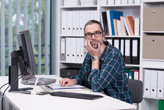 creative man is working in his office
