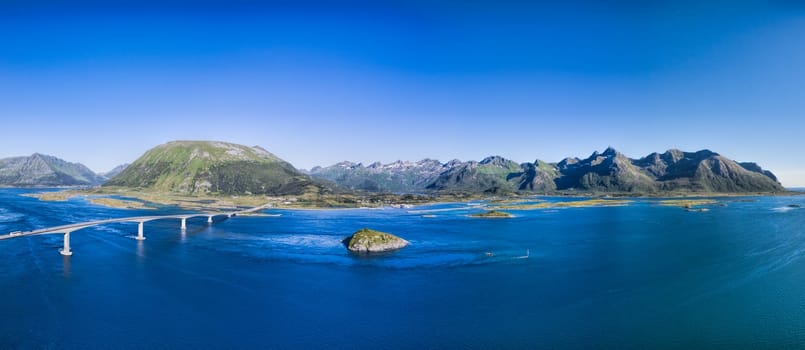 Scenic aerial panorama of Lofoten islands in Norway with huge bridge connecting islands