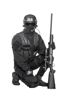 Spec ops police officer SWAT in black uniform and face mask studio shot