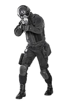 Spec ops police officer SWAT in black uniform and face mask studio shot