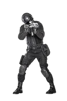 Spec ops police officer SWAT in black uniform and face mask studio shot