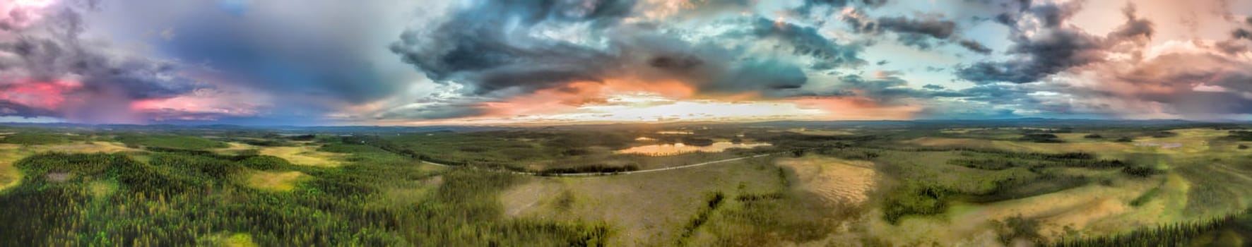 Massive storms brewing over the swedish forests, aerial panorama