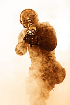 police officer SWAT in black uniform and face mask studio shot